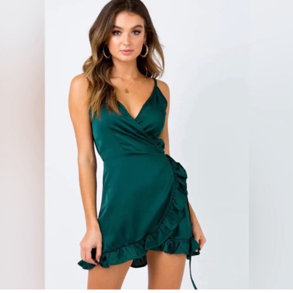 Princess Polly green mini dress, wrap around waist and with ruffles!